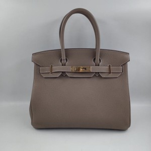 Birkin bolsos 25 de oro