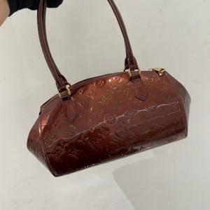 Sra. Louis Vuitton Sherwood PM Bowling Pack