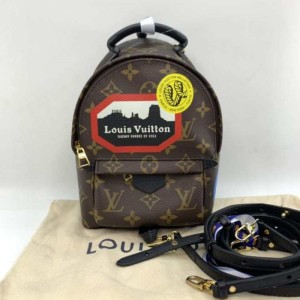 Sra. Louis Vuitton mochila con insignia de flor vieja