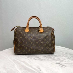 El bolso de Louis Vuitton LV speedy30 retira dinero a mano