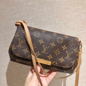 Sra. Louis Vuitton bolso de hombro LV favorite Old Flower Small 3way con bolso de hombro en la mano