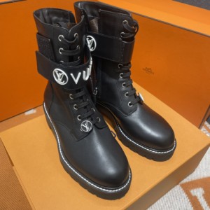 Botas y botas de la Sra. Louis Vuitton