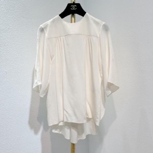  la blusa de la Sra. cuoyi está atada en blanco a Francia [fr]  34