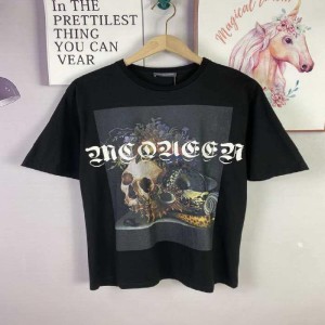 Camiseta Alexander McQueen para hombres y mujeres con patrón de esqueleto negro moda versión suelta de blusa de manga corta